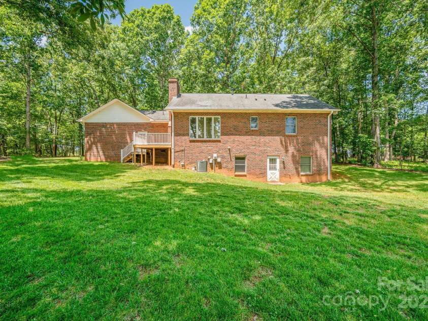 2155 Randolph Road, Shelby, NC 28150.  MLS# CAR4275104, YatesRealty ID 28608. Full view of back of home