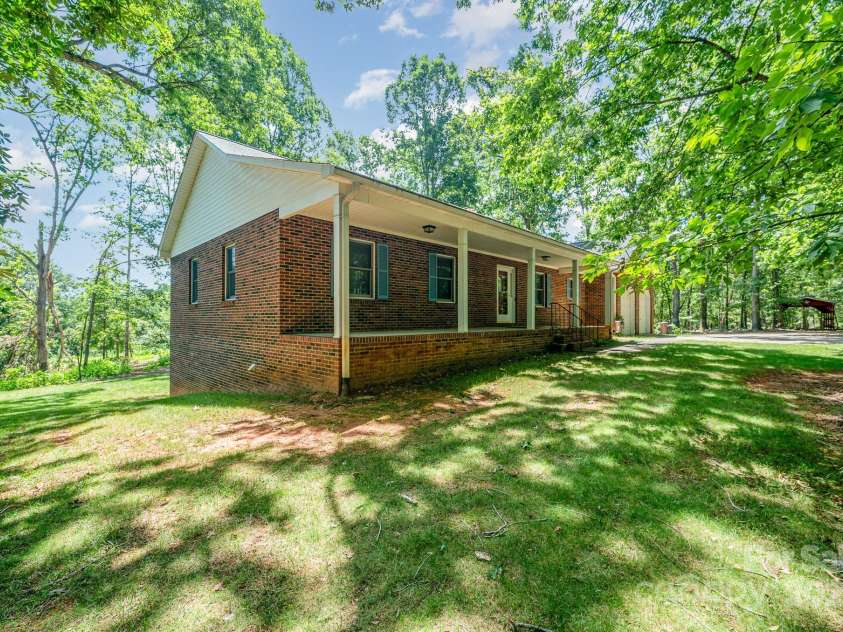 2155 Randolph Road, Shelby, NC 28150.  MLS# CAR4275104, YatesRealty ID 28608. The rocking chair front porch allows for restful enjoyment of the outdoors.