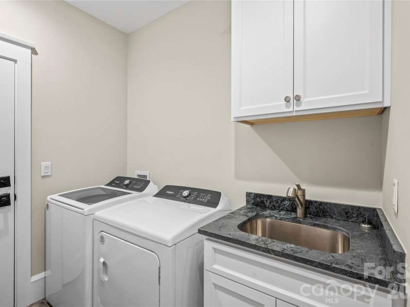 67 Starwood Valley Trail, Arden, NC 28704.  MLS# CAR4377338, YatesRealty ID 28608. Laundry Room