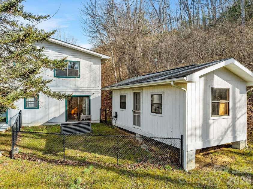 53 Hackberry Lane, Waynesville, NC 28785.  MLS# CAR4284011, YatesRealty ID 2861. Fenced Side Yard & Shed