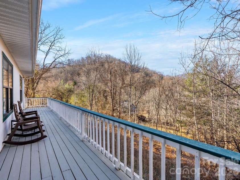 53 Hackberry Lane, Waynesville, NC 28785.  MLS# CAR4284011, YatesRealty ID 2861. Lower Deck Winter Views