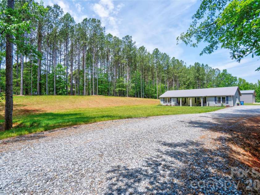 1733 Timber Drive, Mooresboro, NC 28114.  MLS# CAR4387797, YatesRealty ID 28610. Front Right/ Driveway