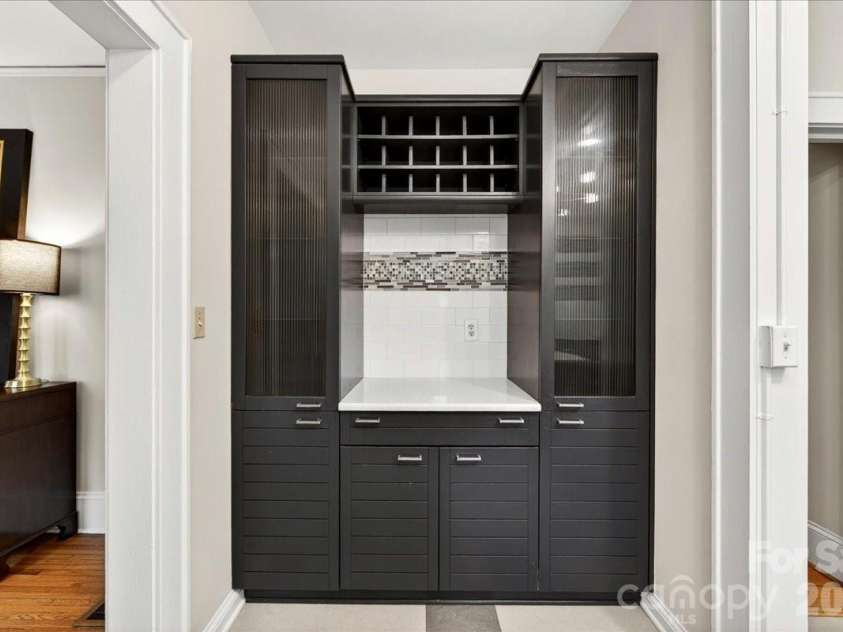 2208 Fifth Street, Charlotte, NC 28204.  MLS# CAR4380576, YatesRealty ID 28616. Kitchen cabinetry for storage 