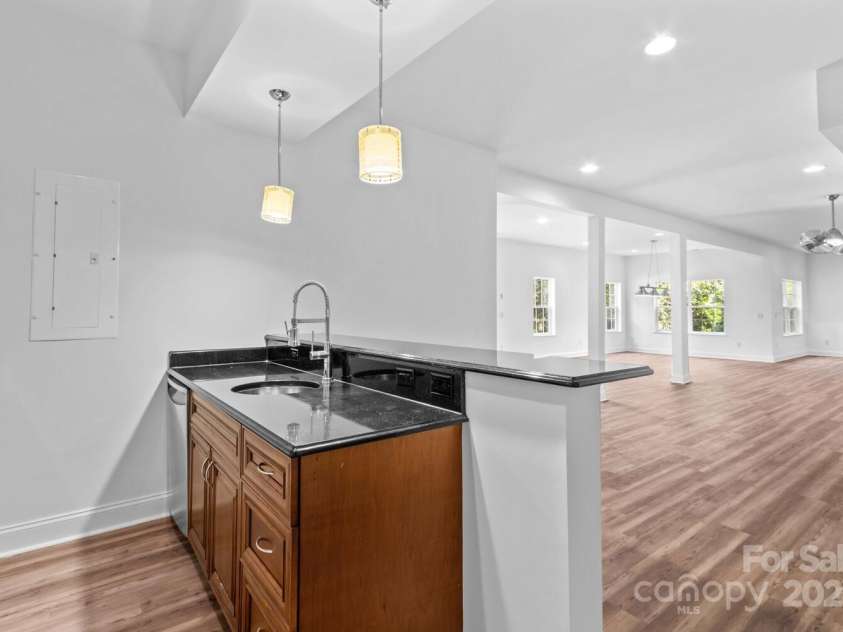 110 Preserve Way, Mooresville, NC 28117.  MLS# CAR4250582, YatesRealty ID 28619. Basement wet bar area includes a dishwasher.