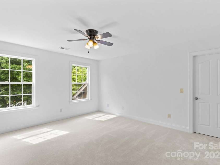 110 Preserve Way, Mooresville, NC 28117.  MLS# CAR4250582, YatesRealty ID 28619. En-suite bedroom 4 on second level with walk-in closet.