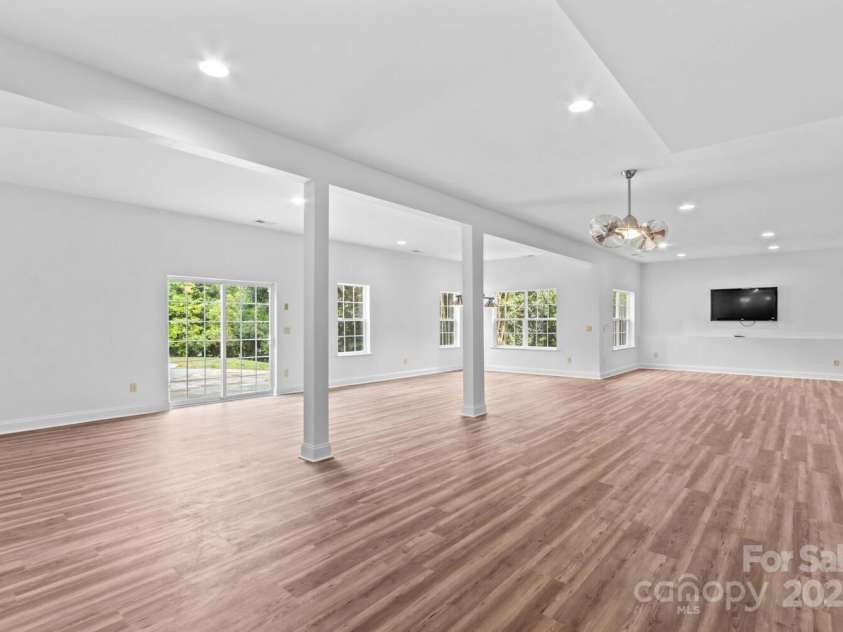 110 Preserve Way, Mooresville, NC 28117.  MLS# CAR4250582, YatesRealty ID 28619. New lvp flooring has just been installed throughout entire basement level.