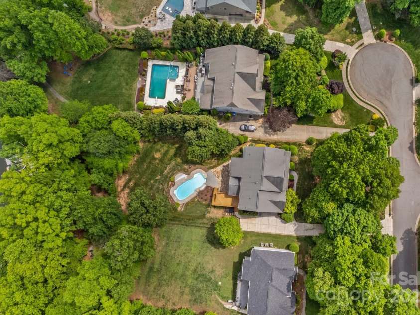 110 Preserve Way, Mooresville, NC 28117.  MLS# CAR4250582, YatesRealty ID 28619. Overview of the large lot with inground pool.