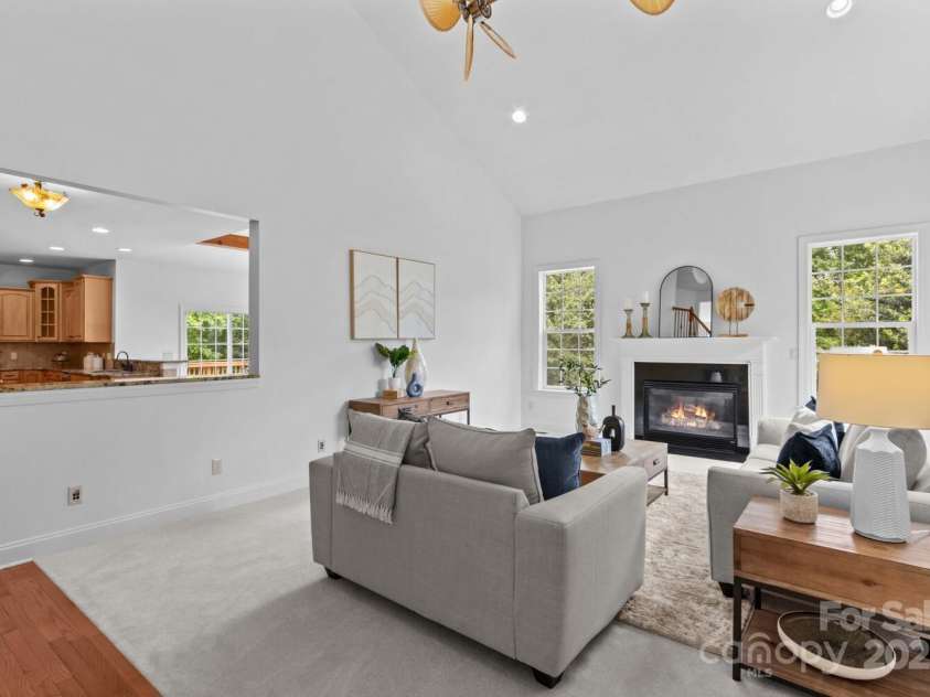 110 Preserve Way, Mooresville, NC 28117.  MLS# CAR4250582, YatesRealty ID 28619. Two-story great room has second gas fireplace and brand new carpet.