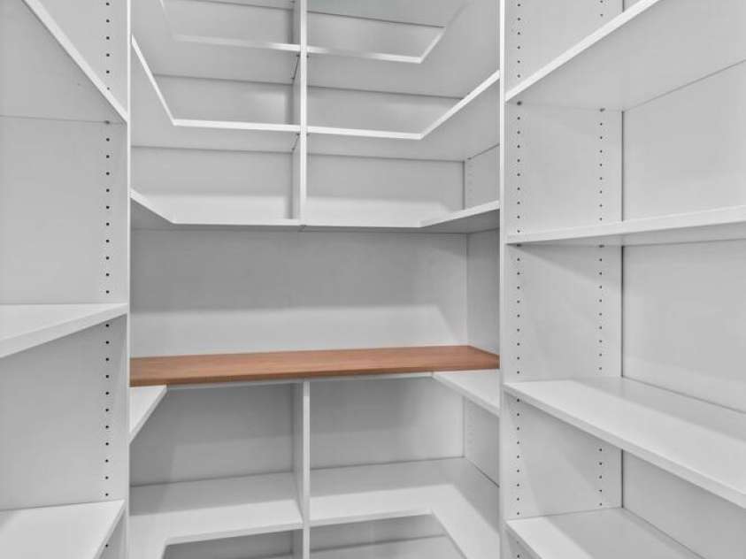 110 Preserve Way, Mooresville, NC 28117.  MLS# CAR4250582, YatesRealty ID 28619. Walk-in pantry with custom shelving.