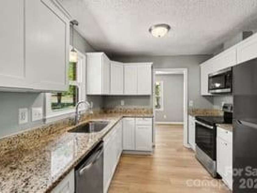 7040 Idlewild Road, Charlotte, NC 28212.  MLS# CAR4373418, YatesRealty ID 28620. 