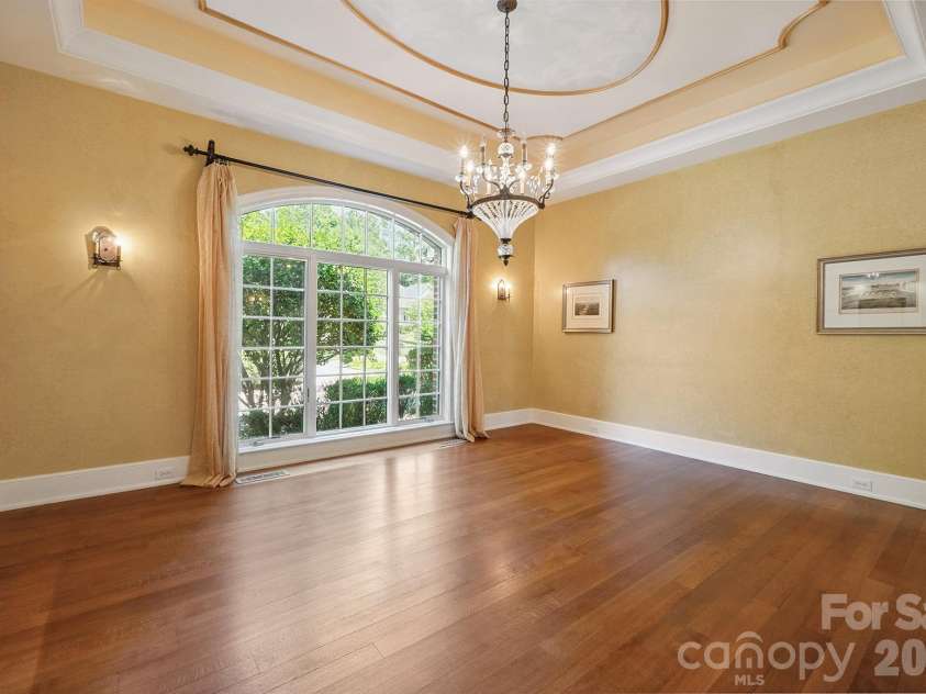 1515 Baltusrol Drive, Denver, NC 28037.  MLS# CAR4224856, YatesRealty ID 28621. Designer Crystal and Cast Metal Chandelier and Candelabra Wall Sconces.