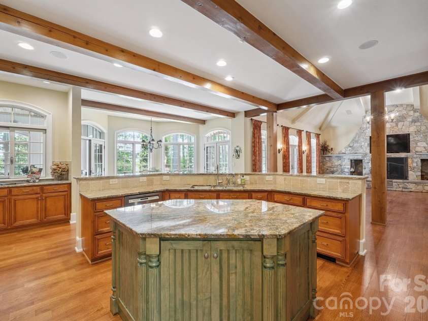 1515 Baltusrol Drive, Denver, NC 28037.  MLS# CAR4224856, YatesRealty ID 28621. Distinctive Custom-Cabinetry Island, Prep while Staying Connected!