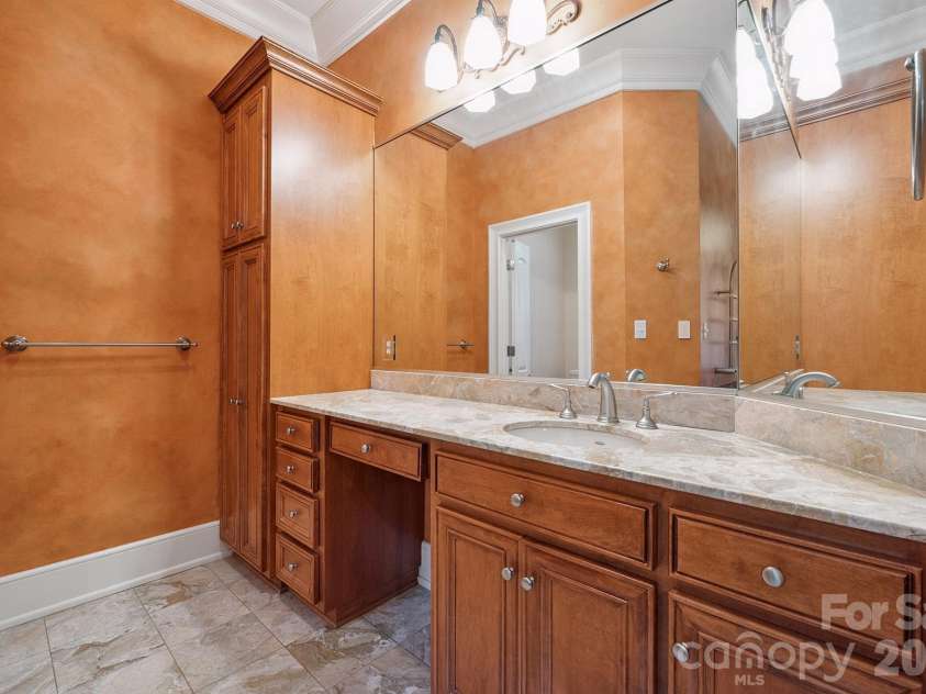 1515 Baltusrol Drive, Denver, NC 28037.  MLS# CAR4224856, YatesRealty ID 28621. Dual/Separate Marble Vanities and Custom Linen Cabinet.