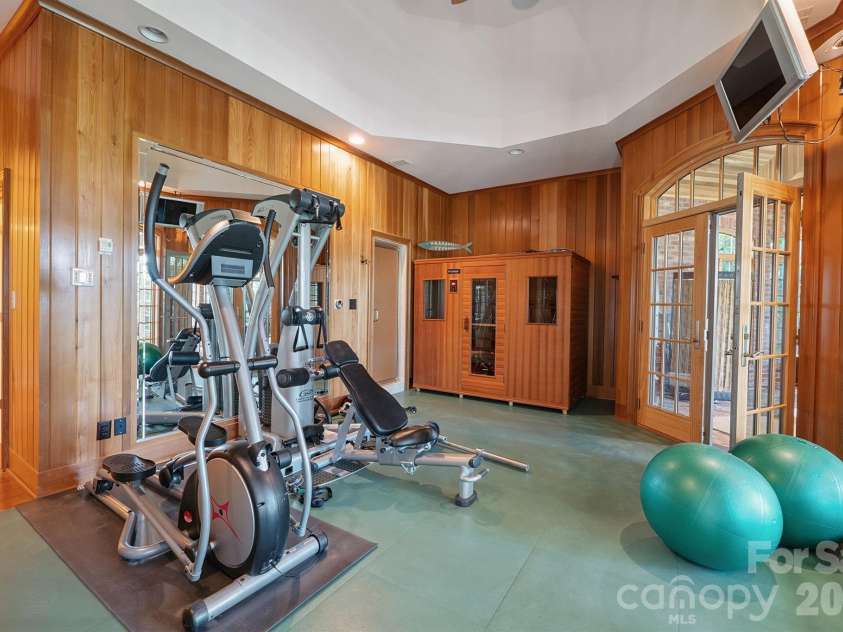 1515 Baltusrol Drive, Denver, NC 28037.  MLS# CAR4224856, YatesRealty ID 28621. Gorgeous Wood-Paneled Fitness Room with Pro-Grade Flooring.