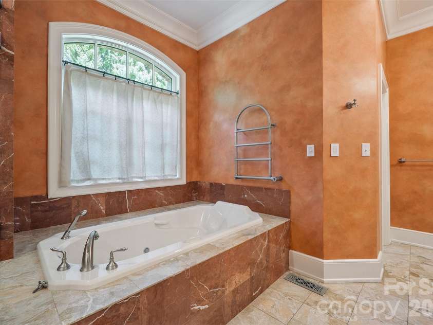 1515 Baltusrol Drive, Denver, NC 28037.  MLS# CAR4224856, YatesRealty ID 28621. Soaking Jet Tub, Towel Warmer Rack and Separate Commode Room.