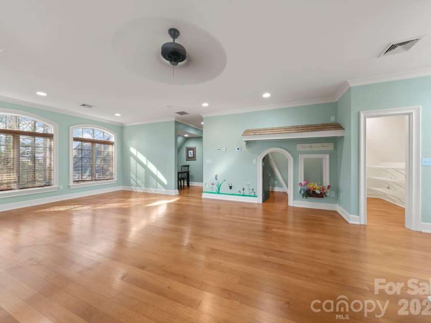 1515 Baltusrol Drive, Denver, NC 28037.  MLS# CAR4224856, YatesRealty ID 28621. Storybook-Inspired Playroom with Arched Entry Door, Roof Facade,Flower-Box Window and Built-In Bunk Beds.
