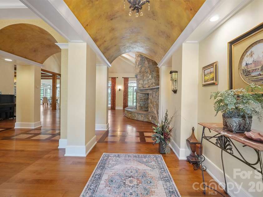 1515 Baltusrol Drive, Denver, NC 28037.  MLS# CAR4224856, YatesRealty ID 28621. Welcoming Front Entry Hall with Barrel Ceiling, Faux Finish and Art Niche.