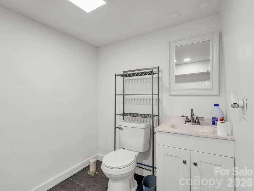 151 Woodside Drive, Forest City, NC 28043.  MLS# CAR4388065, YatesRealty ID 28624. Basement full bath