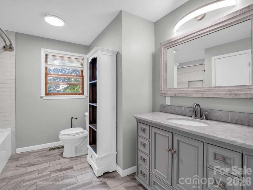 151 Woodside Drive, Forest City, NC 28043.  MLS# CAR4388065, YatesRealty ID 28624. Hallway full bath