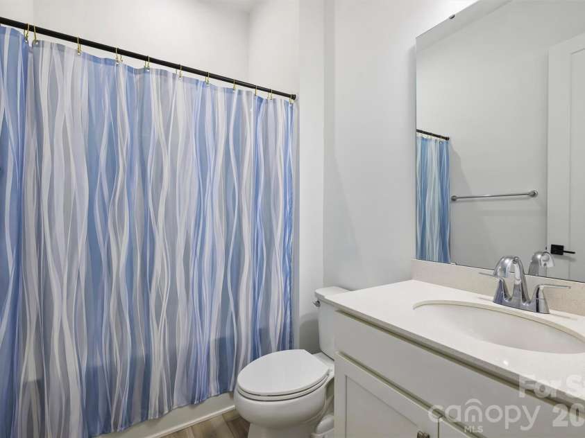 8044 Brookbank Drive, Charlotte, NC 28269.  MLS# CAR4387467, YatesRealty ID 28626. Main Level Second Bath