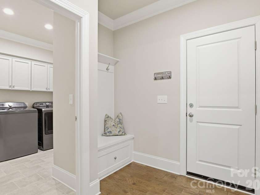 9823 Ardley Park Way, Mint Hill, NC 28227.  MLS# CAR4387355, YatesRealty ID 28629. Convenient laundry room and drop zone