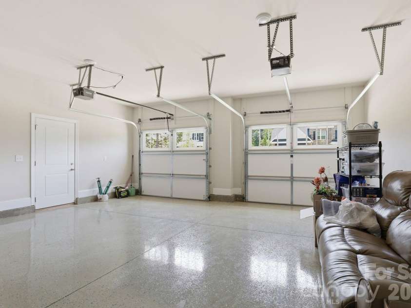 9823 Ardley Park Way, Mint Hill, NC 28227.  MLS# CAR4387355, YatesRealty ID 28629. Expanded 2 car garage with epoxy floors