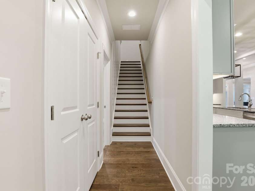 9823 Ardley Park Way, Mint Hill, NC 28227.  MLS# CAR4387355, YatesRealty ID 28629. Stairs to upper level