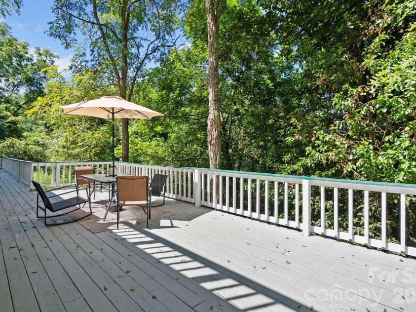 53 Hackberry Lane, Waynesville, NC 28785.  MLS# CAR4284011, YatesRealty ID 2863. Expansive Deck (Summer)