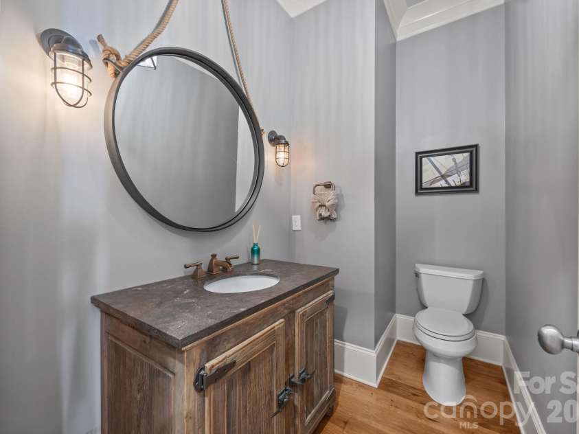 20727 Pointe Regatta Drive, Cornelius, NC 28031.  MLS# CAR4370865, YatesRealty ID 28632. Convenient half bath for guests.