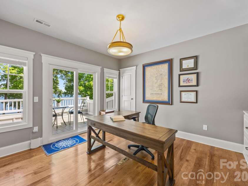 20727 Pointe Regatta Drive, Cornelius, NC 28031.  MLS# CAR4370865, YatesRealty ID 28632. Private office with beautiful lake views.