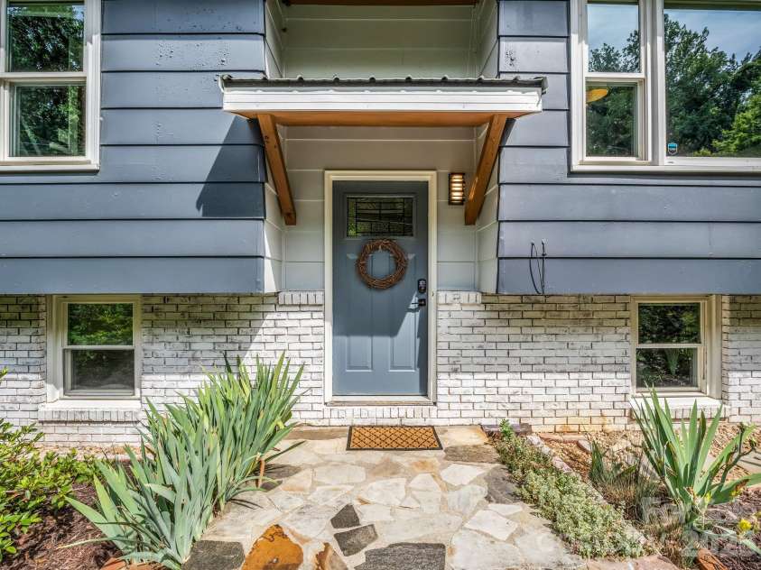 395 Howard Street, Tryon, NC 28782.  MLS# CAR4387885, YatesRealty ID 28635. 