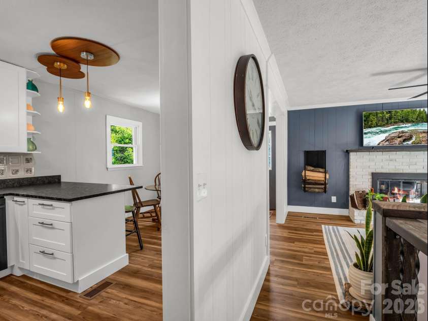 395 Howard Street, Tryon, NC 28782.  MLS# CAR4387885, YatesRealty ID 28635. 