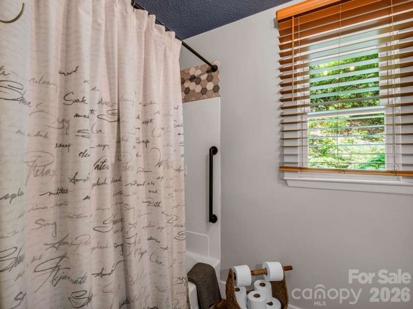 395 Howard Street, Tryon, NC 28782.  MLS# CAR4387885, YatesRealty ID 28635. 