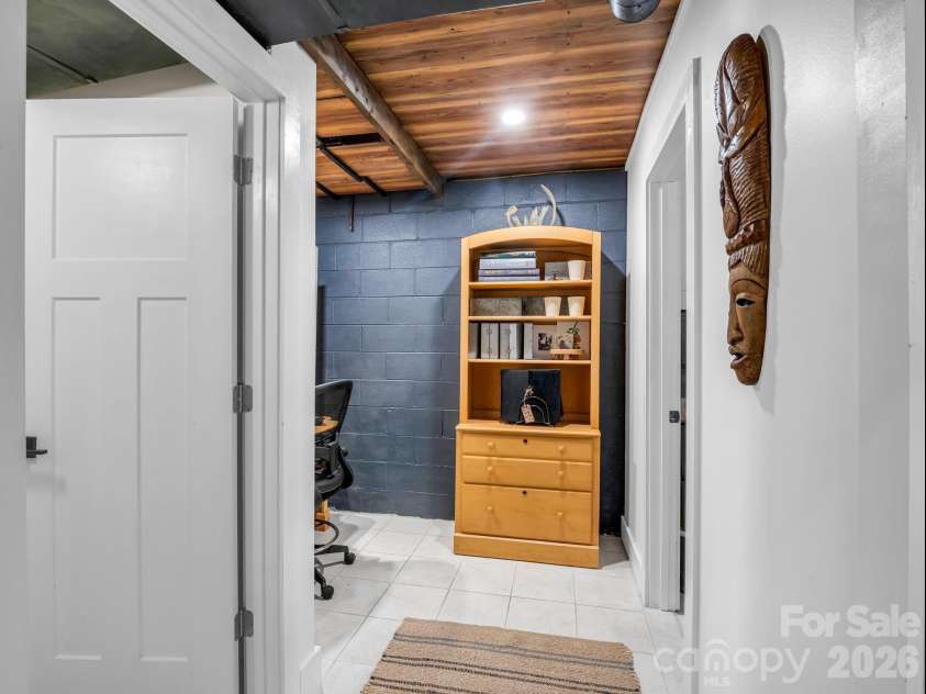 395 Howard Street, Tryon, NC 28782.  MLS# CAR4387885, YatesRealty ID 28635. 