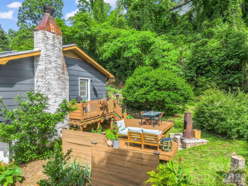 395 Howard Street, Tryon, NC 28782.  MLS# CAR4387885, YatesRealty ID 28635. 