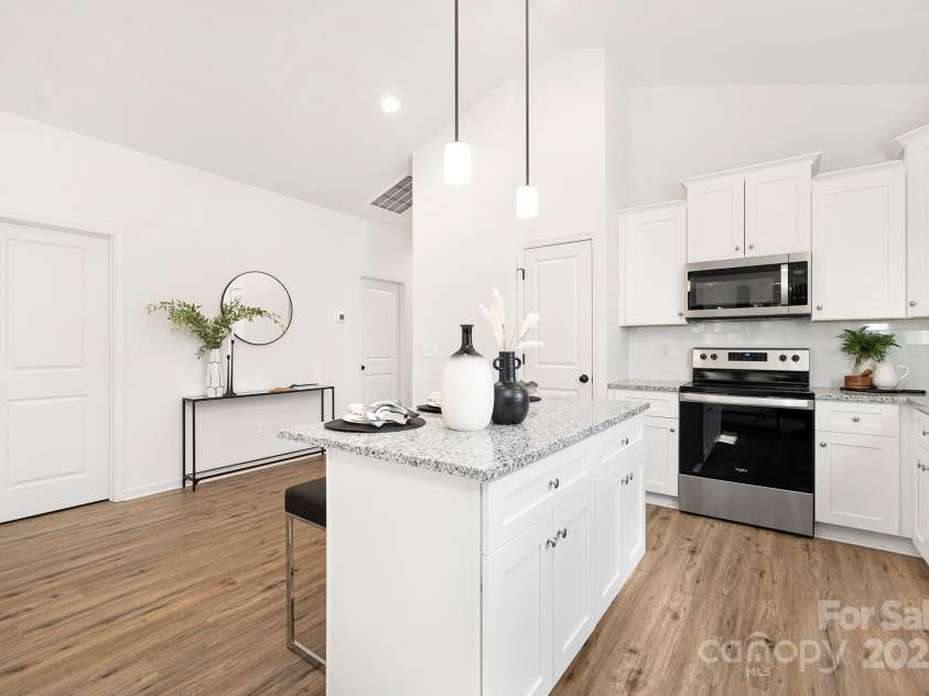6301 Rockwell Boulevard, Charlotte, NC 28269.  MLS# CAR4279122, YatesRealty ID 28635. Representation