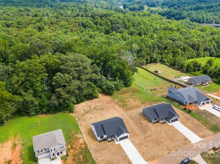 153 Pumice Drive, Statesville, NC 28625.  MLS# CAR4285577, YatesRealty ID 28645. 