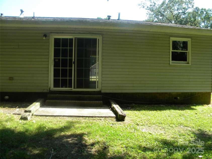 390 Torbush Drive, Salisbury, NC 28144.  MLS# CAR4284924, YatesRealty ID 28647. Sliding Door from Dining Room
