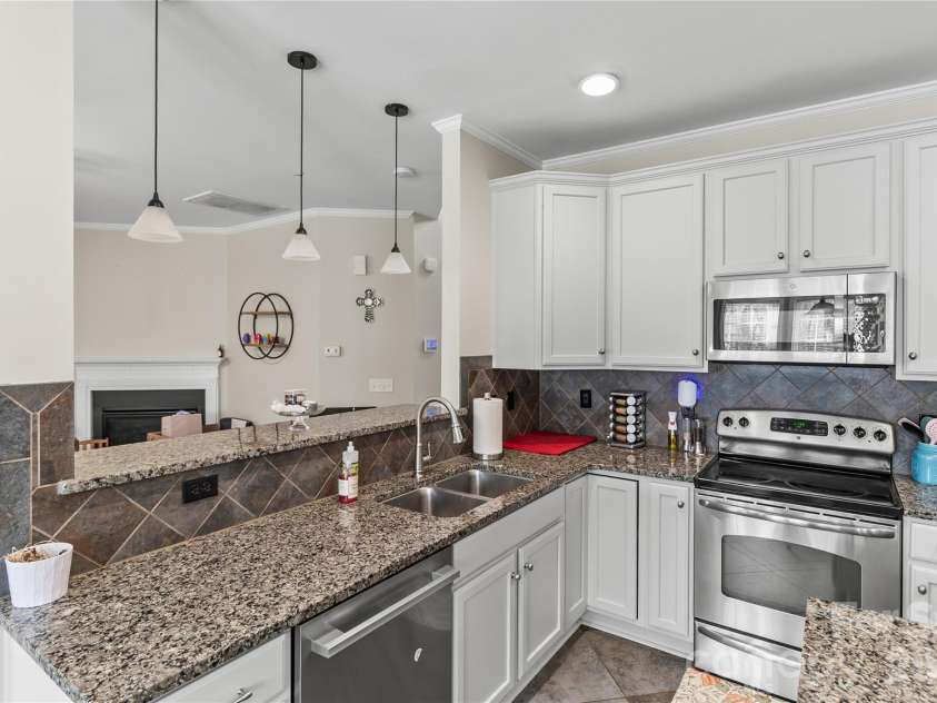 7030 Carrington Pointe Drive, Huntersville, NC 28078.  MLS# CAR4361718, YatesRealty ID 28647. 