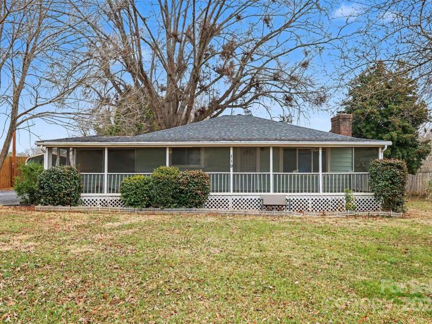 119 Moore Drive, Gastonia, NC 28056.  MLS# CAR4332115, YatesRealty ID 2865. Charming ranch home featuring a full-length screened front porch, perfect for relaxing and enjoying the outdoors year-round.