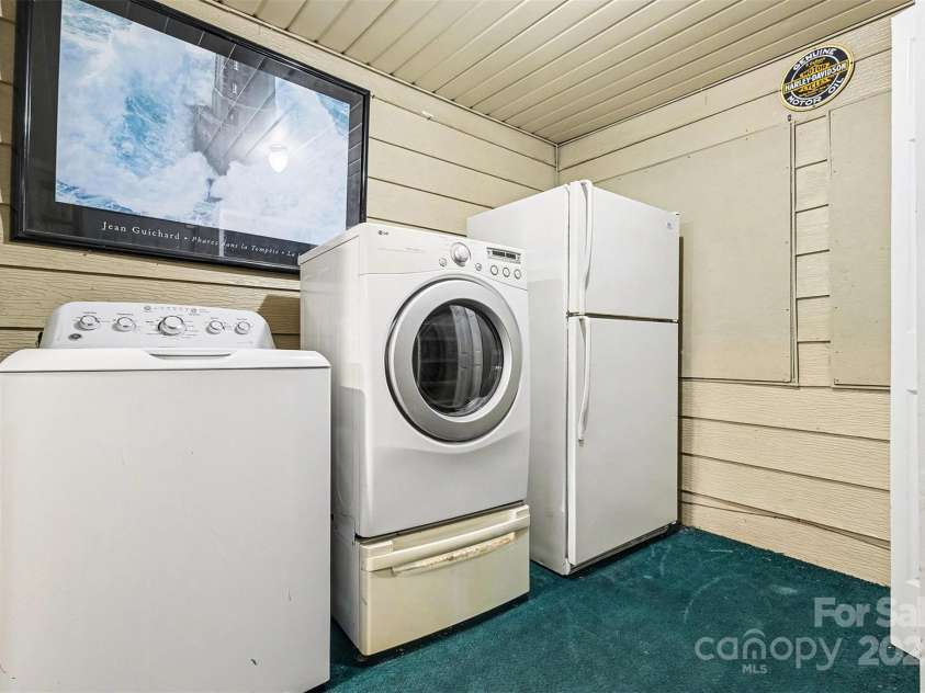 119 Moore Drive, Gastonia, NC 28056.  MLS# CAR4332115, YatesRealty ID 2865. Dedicated laundry area offering space for washer and dryer, along with additional room for storage or extra appliances. The enclosed setup provides convenience and flexibility, making it ideal for everyday household needs wh