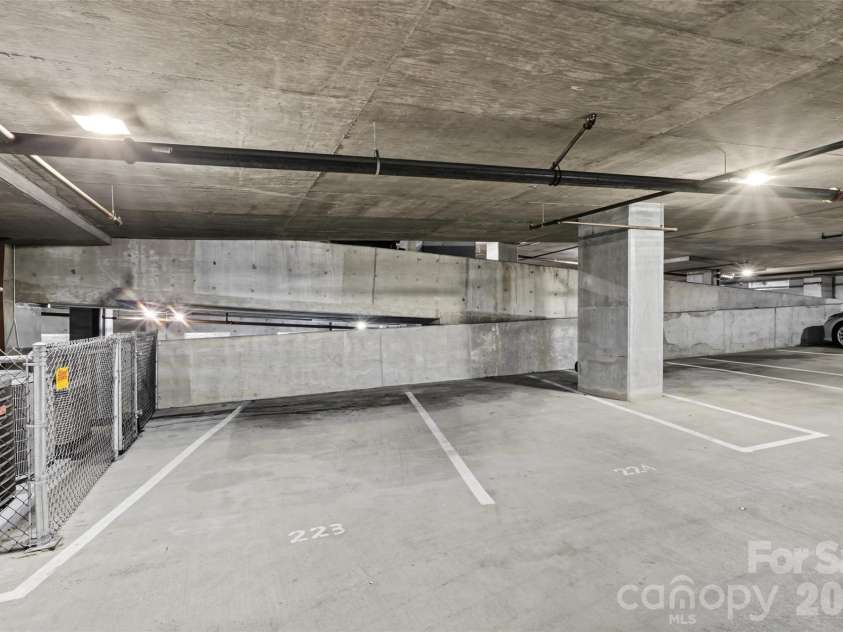 210 Church Street, Charlotte, NC 28202.  MLS# CAR4428306, YatesRealty ID 2865. 2 deeded parking spaces
