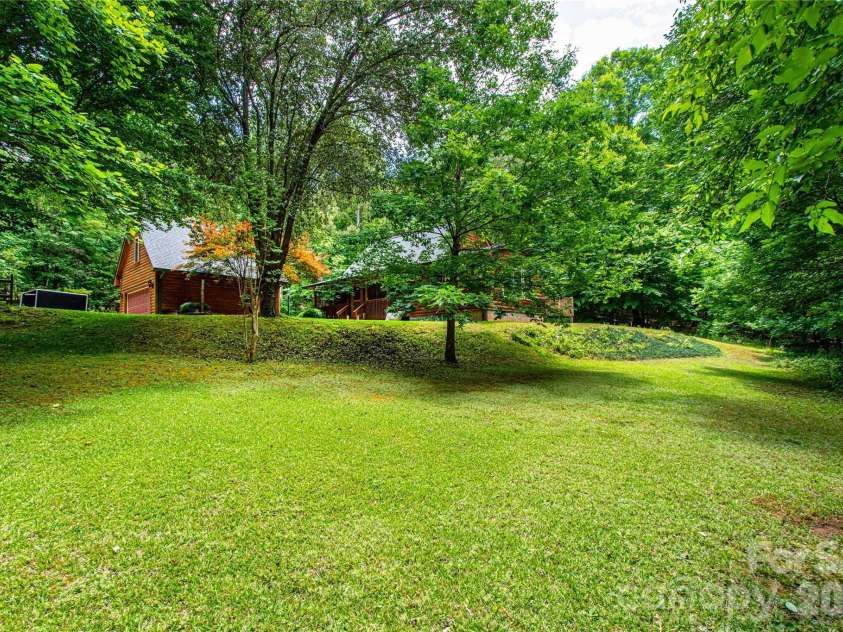 762 Willow Lakes Drive, Rutherfordton, NC 28139.  MLS# CAR4389394, YatesRealty ID 28657. Gently rolling yard