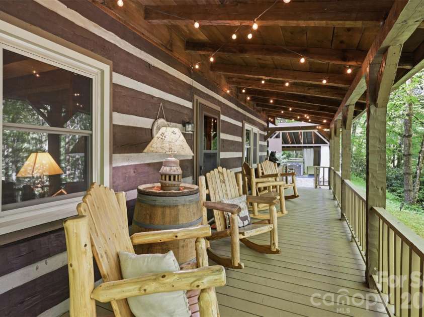 2146 Nc Highway 194 Highway, Boone, NC 28607.  MLS# CAR4388120, YatesRealty ID 28661. Spacious covered front porch
