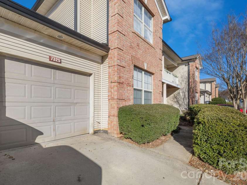 7325 Michaels Landing Drive, Charlotte, NC 28262.  MLS# CAR4330615, YatesRealty ID 28664. Garage