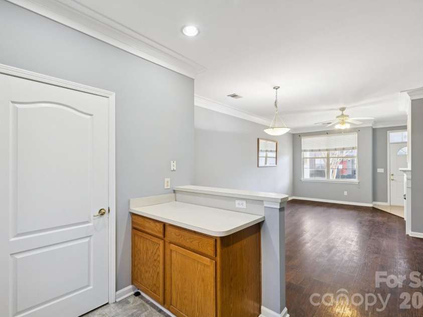7325 Michaels Landing Drive, Charlotte, NC 28262.  MLS# CAR4330615, YatesRealty ID 28664. Kitchen (Breakfast Bar View)