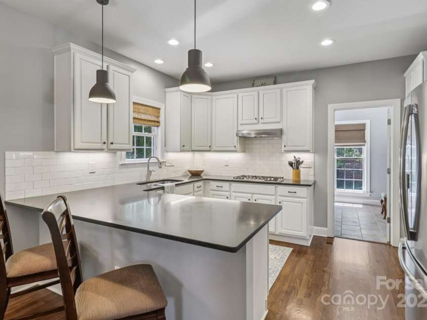9735 Devonshire Drive, Huntersville, NC 28078.  MLS# CAR4276050, YatesRealty ID 28664. Bright white kitchen