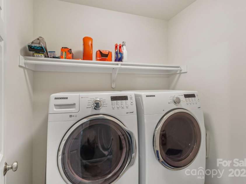 9735 Devonshire Drive, Huntersville, NC 28078.  MLS# CAR4276050, YatesRealty ID 28664. Laundry room conveniently located next to the bedrooms