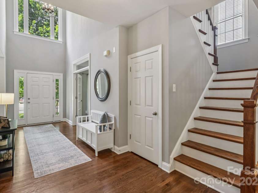 9735 Devonshire Drive, Huntersville, NC 28078.  MLS# CAR4276050, YatesRealty ID 28664. Natural light fills the foyer and the stairway