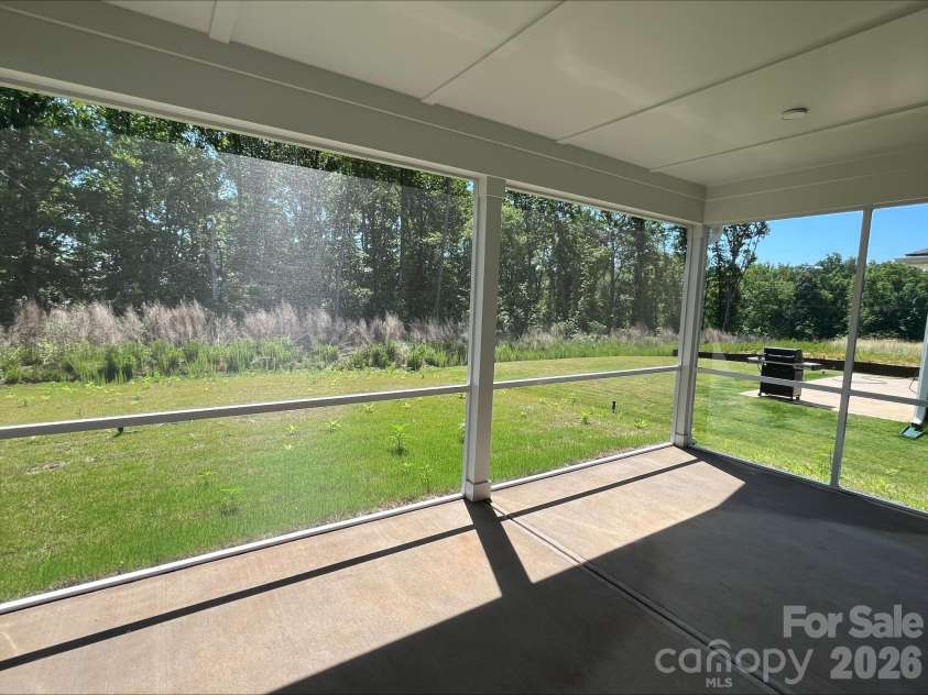 2001 Quiet Woods Road, Monroe, NC 28110.  MLS# CAR4383567, YatesRealty ID 28665. Extended Screened in Patio